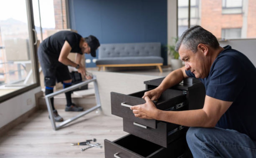 istockphoto-1408152506-612x612_1050x650_q90 Professional movers taking apart couch pieces