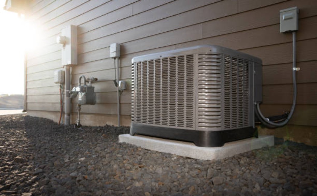 White modern air conditioner with vents visible from the front